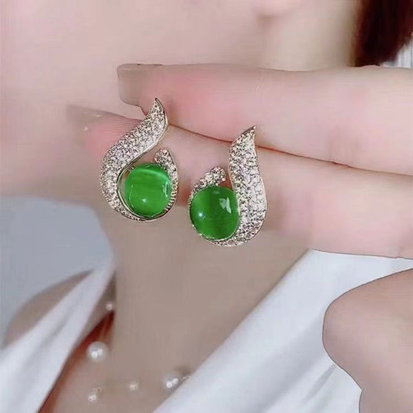 Elegant simulated pearl and rhinestone stud earrings