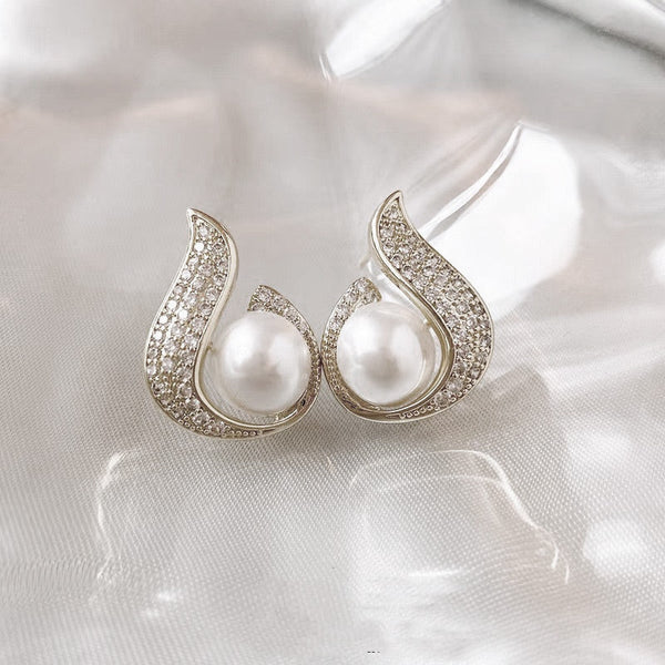 Elegant simulated pearl and rhinestone stud earrings