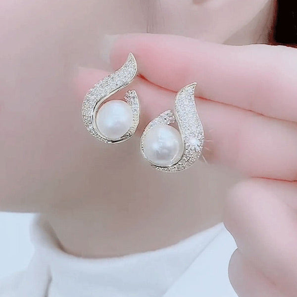 Elegant simulated pearl and rhinestone stud earrings