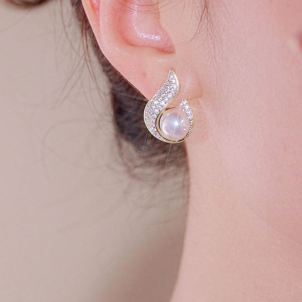 Elegant simulated pearl and rhinestone stud earrings