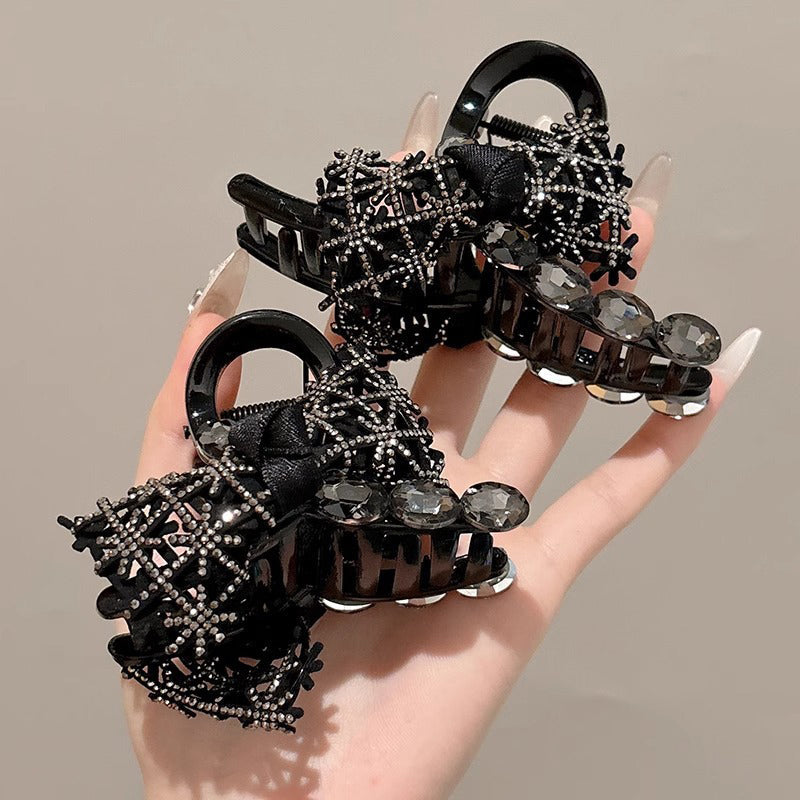 Elegant, sparkling hair clip with bow and artificial diamond