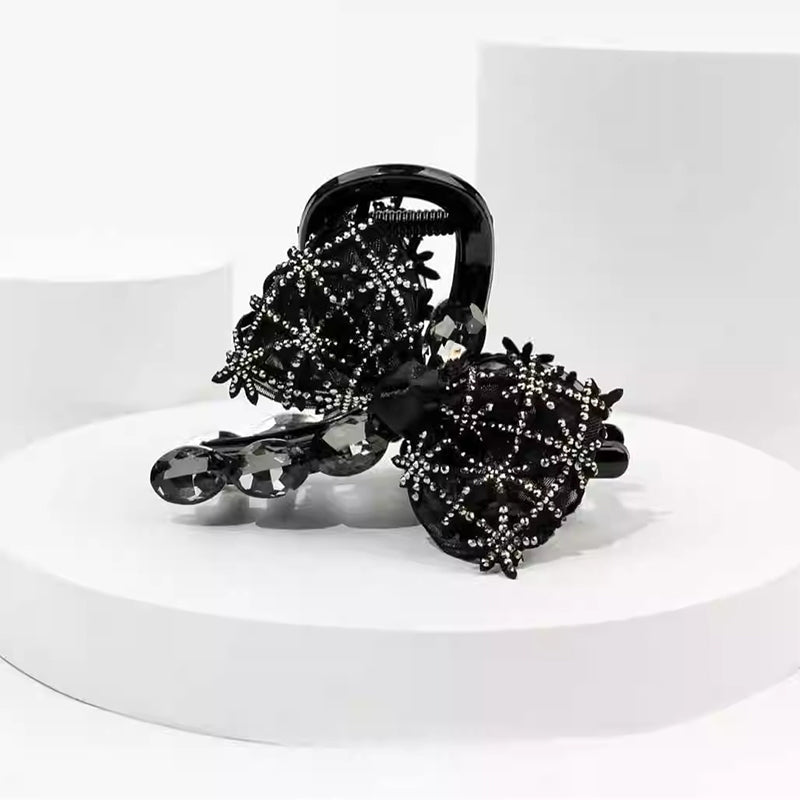 Elegant, sparkling hair clip with bow and artificial diamond
