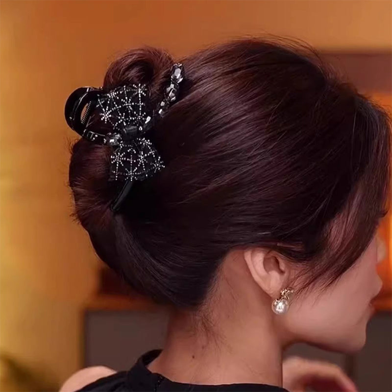 Elegant, sparkling hair clip with bow and artificial diamond