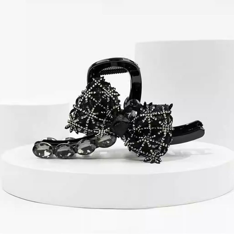 Elegant, sparkling hair clip with bow and artificial diamond