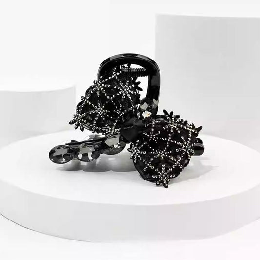 Elegant, sparkling hair clip with bow and artificial diamond